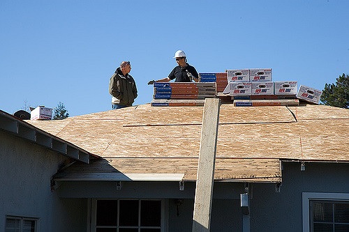 Roofing Contractor at Work in Frisco, TX