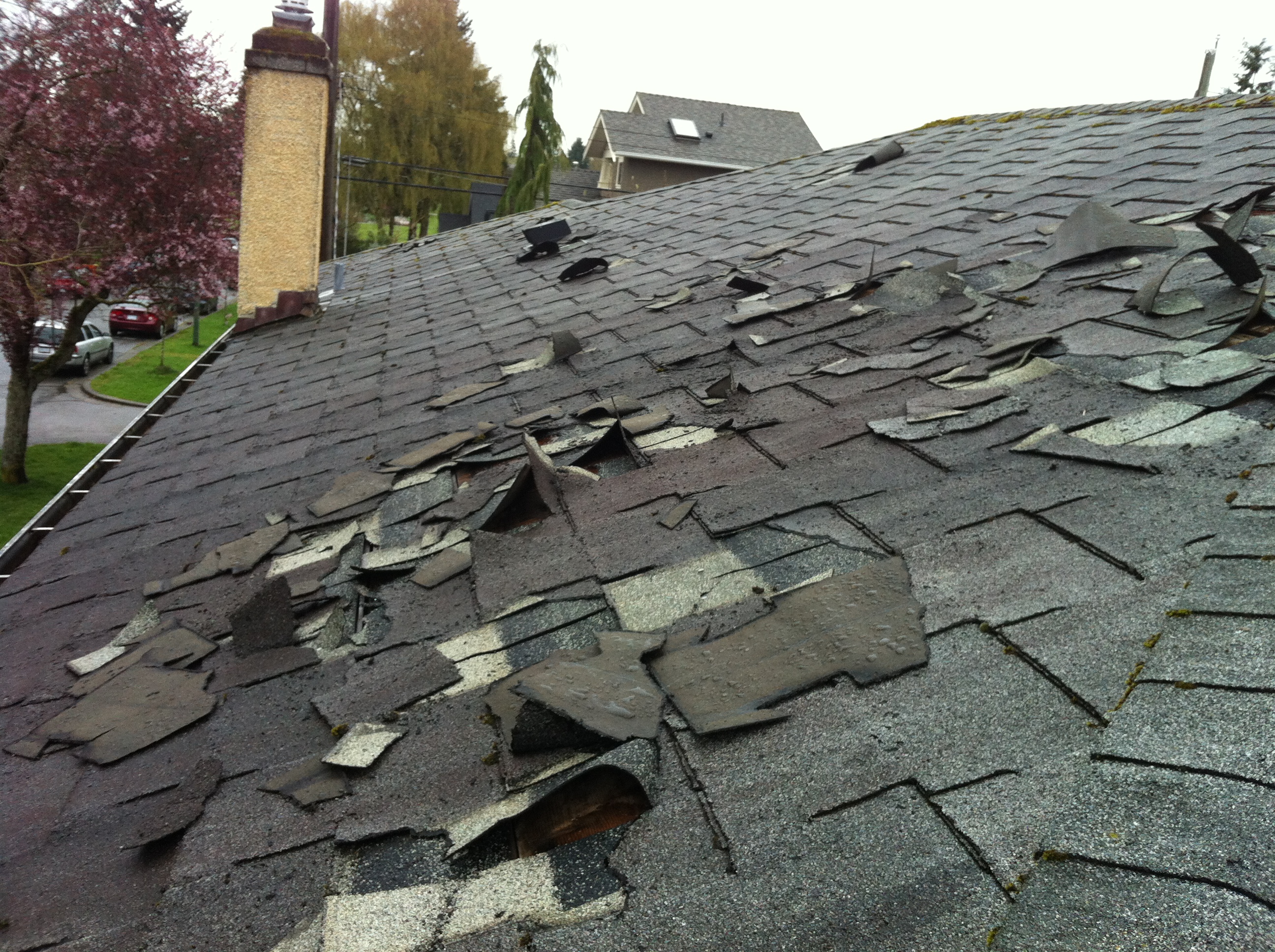 roof that has been damaged by a storm